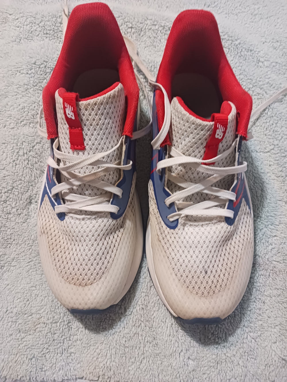 New Balance Kids' White Mesh Running Shoes with Red and Blue Accents